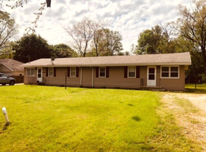 1955-65 West Southmor Road Morris, IL 60450 - Photo 1 of 12 a front view of a building with a swimming pool