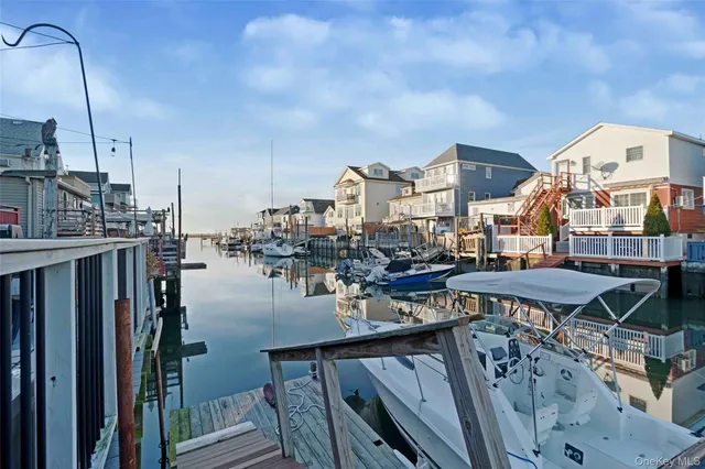 a view of a balcony with chairs