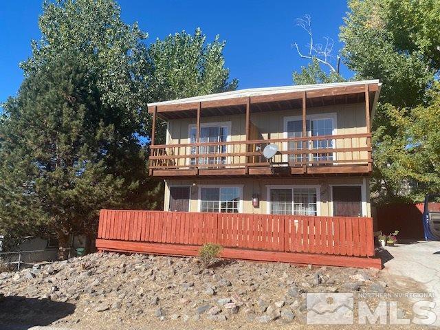 2133 Patton Drive Reno, NV 89512 - Photo 1 of 23 a view of a house with wooden fence