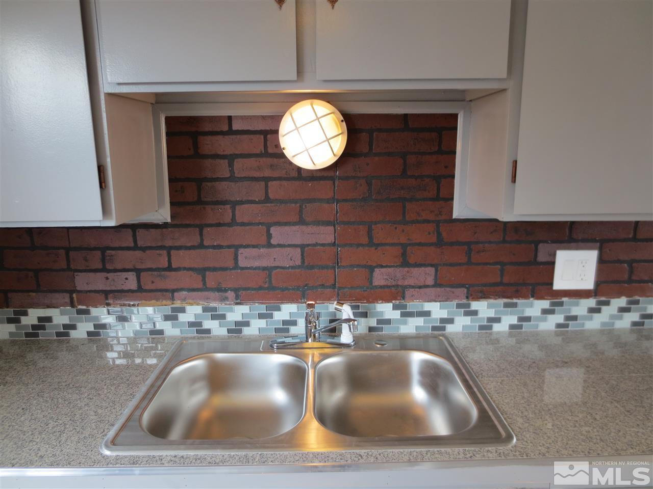 2133 Patton Drive Reno, NV 89512 - Photo 15 of 23 a view of a sink and chandelier