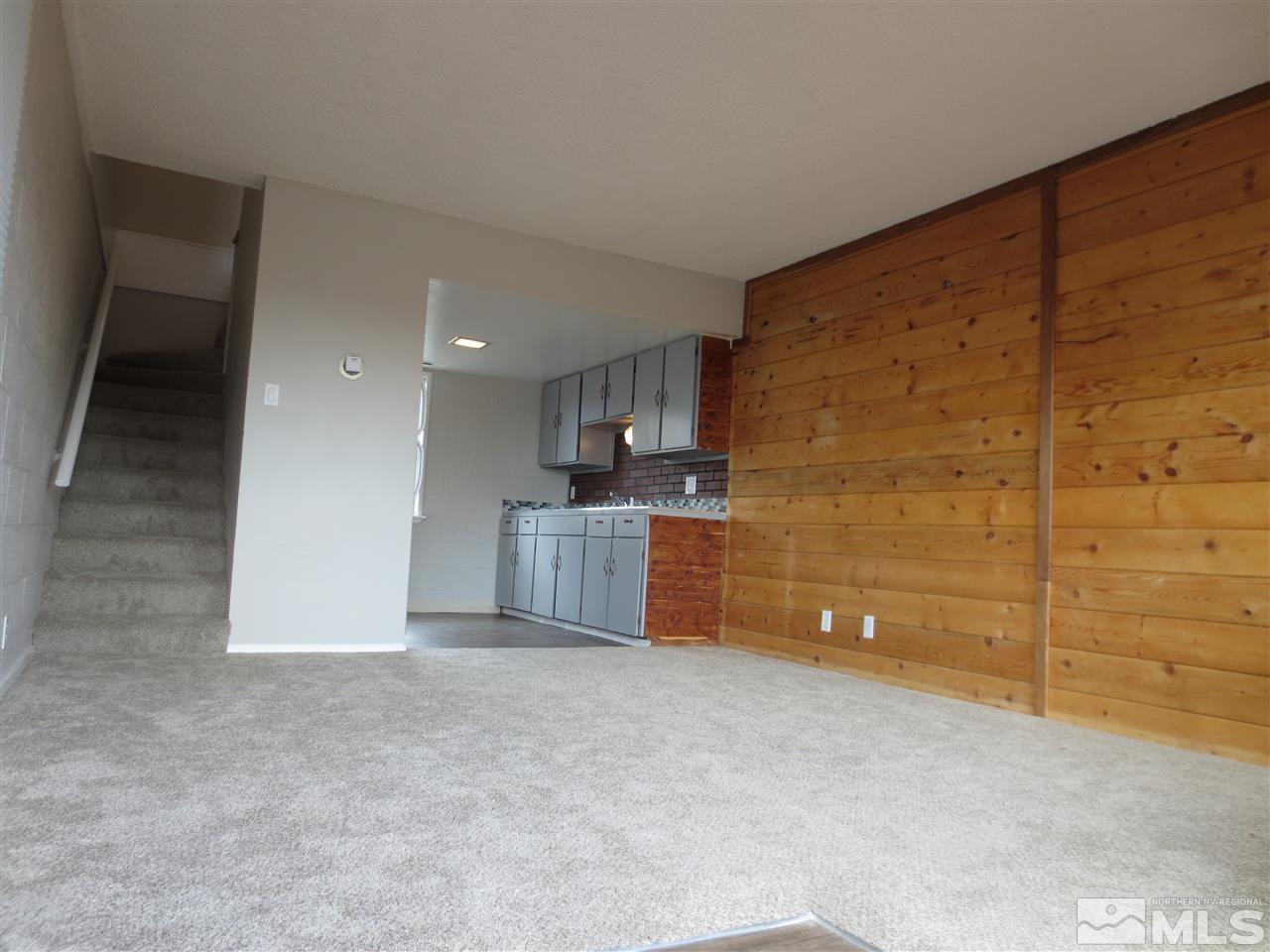 2133 Patton Drive Reno, NV 89512 - Photo 17 of 23 a view of an empty room with kitchen and a window