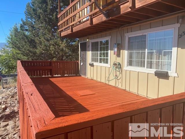 2133 Patton Drive Reno, NV 89512 - Photo 2 of 23 a view of a roof deck with wooden floor and fence