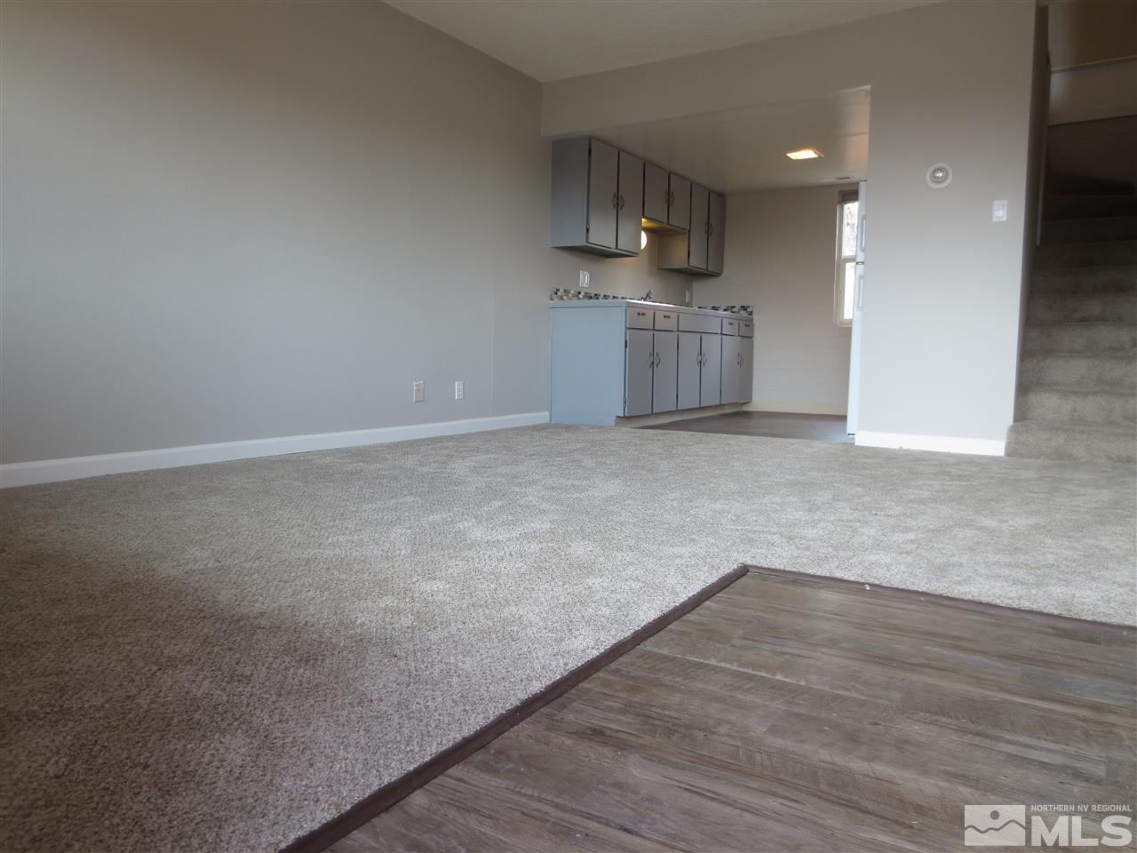 2133 Patton Drive Reno, NV 89512 - Photo 6 of 23 a view of a kitchen with cabinets and wooden floor