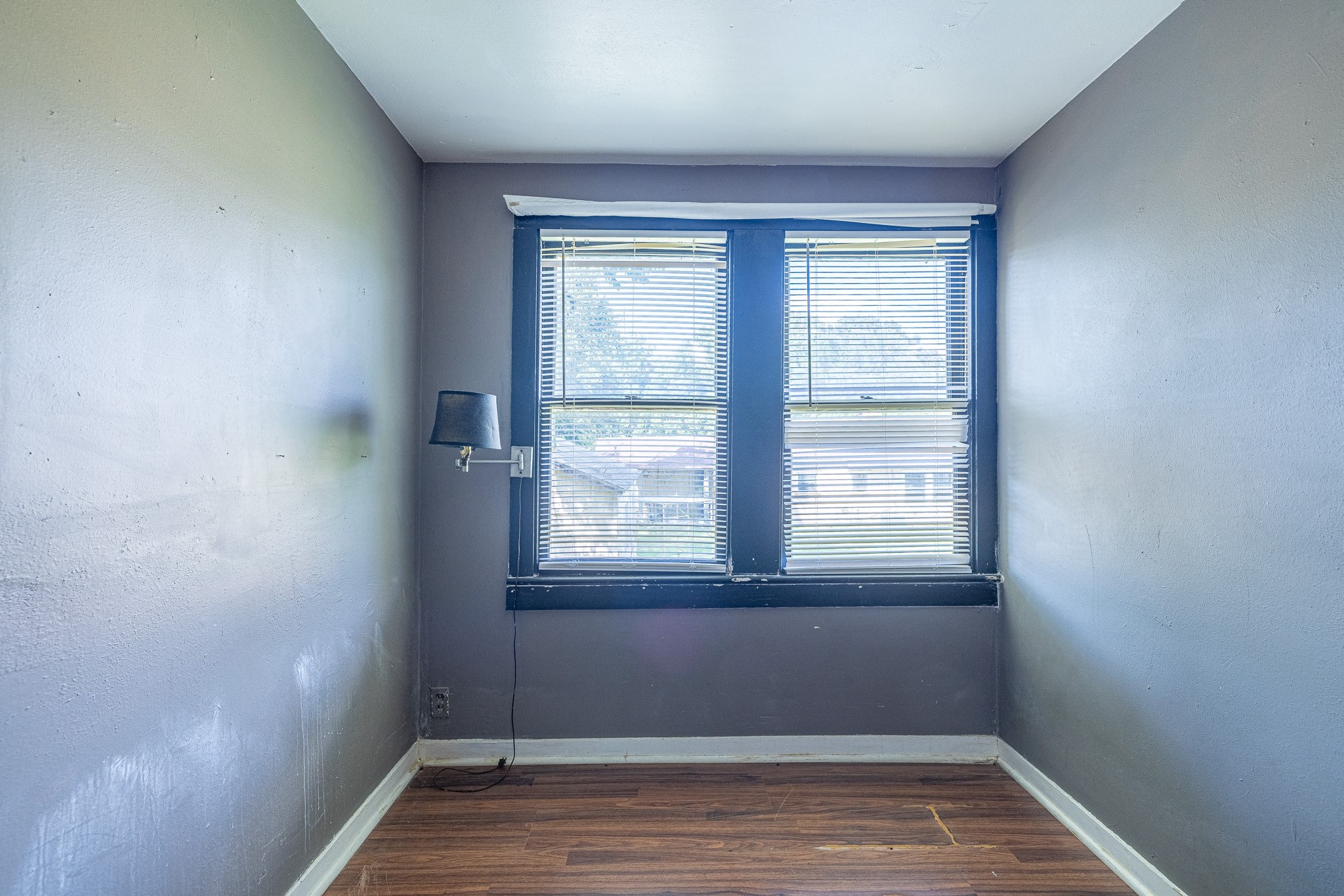 8548 Findlay Street Houston, TX 77017 - Photo 45 of 50 a view of an empty room with wooden floor and a window