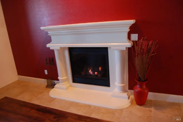 a living room with a fireplace