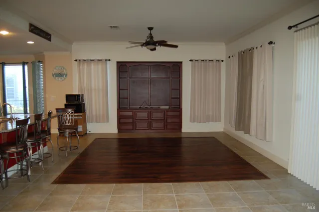 wooden floor in a hall with an entryway