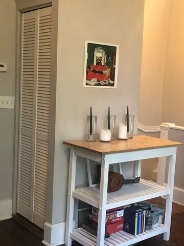 a view of cabinets and wooden floor