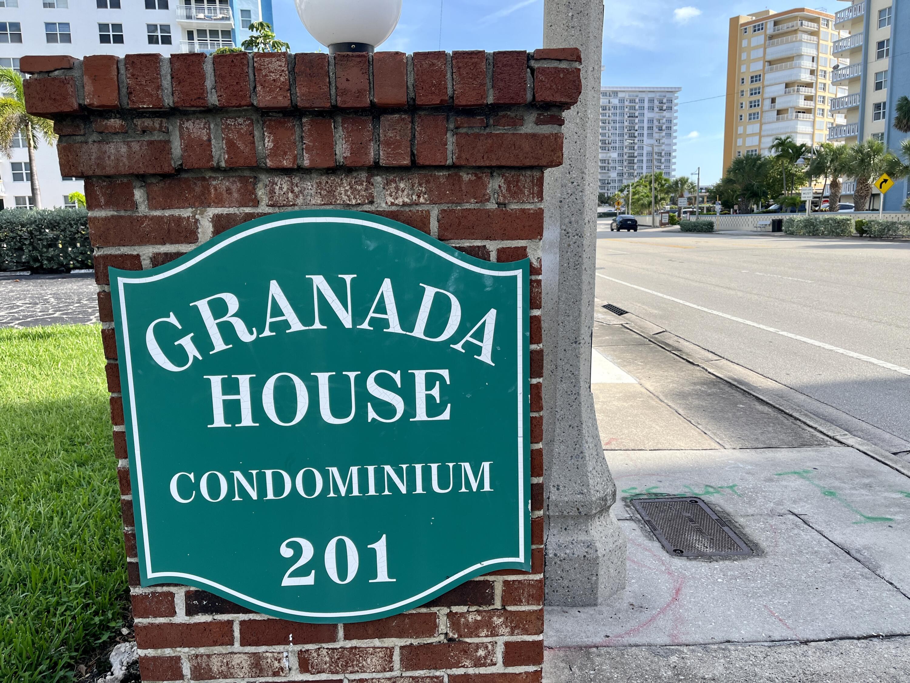 201 North Ocean Boulevard, Unit 302 Pompano Beach, FL 33062 - Photo 39 of 39 a sign on the side of a street