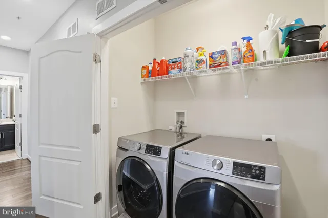 a utility room with dryer and washer