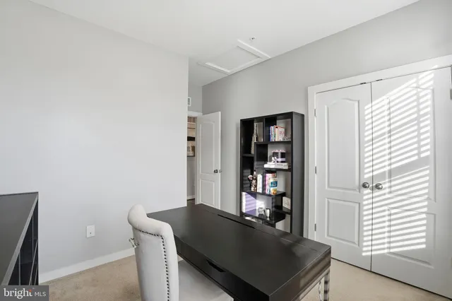 a living room with furniture and decor
