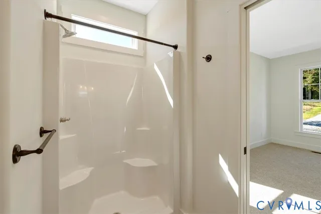 a view of an empty walk in closet