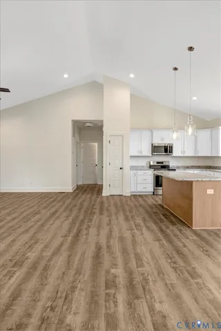 a bathroom with a sink a toilet and a window
