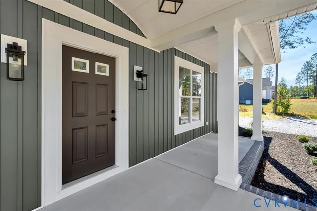 a view of livingroom with furniture and windows