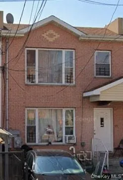 a front view of a house with yard