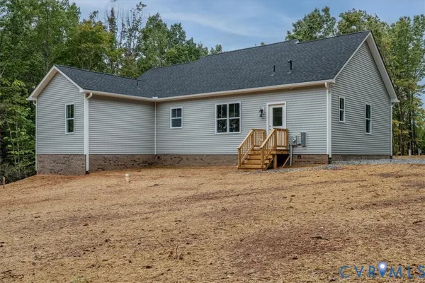 a view of backyard of house