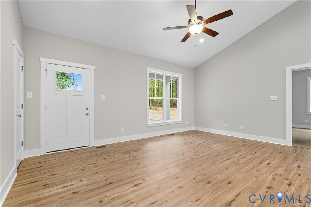 1646 Jerusalem Church Road Buckingham, VA 23921 - Photo 3 of 19 wooden floor in an empty room with a window