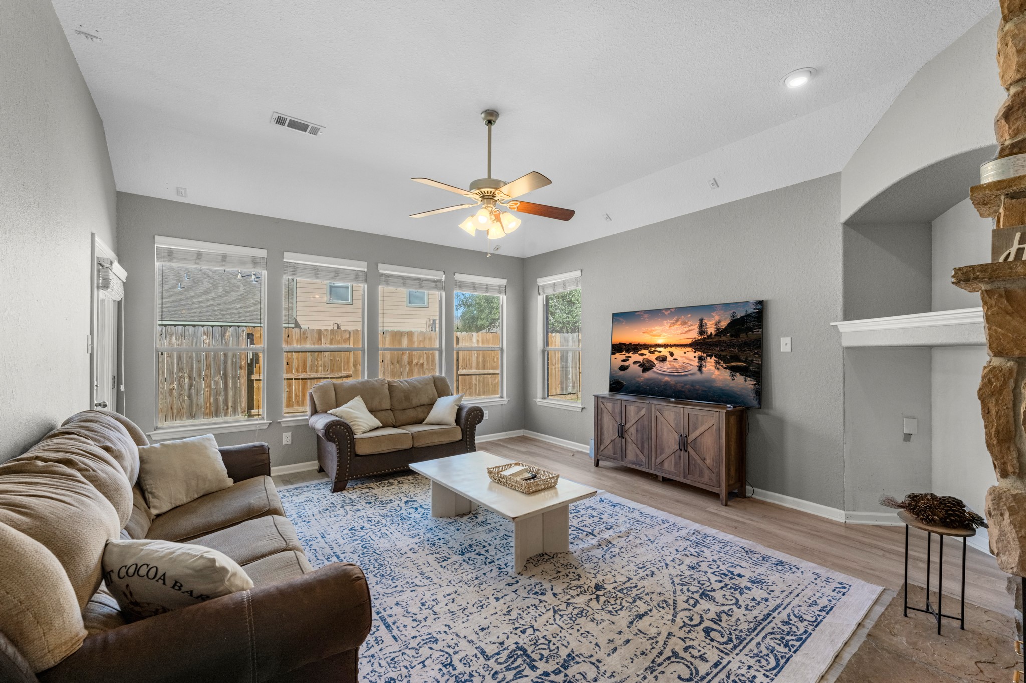 19310 Arbor Breeze Court Spring, TX 77379 - Photo 16 of 37 a living room with furniture and a flat screen tv