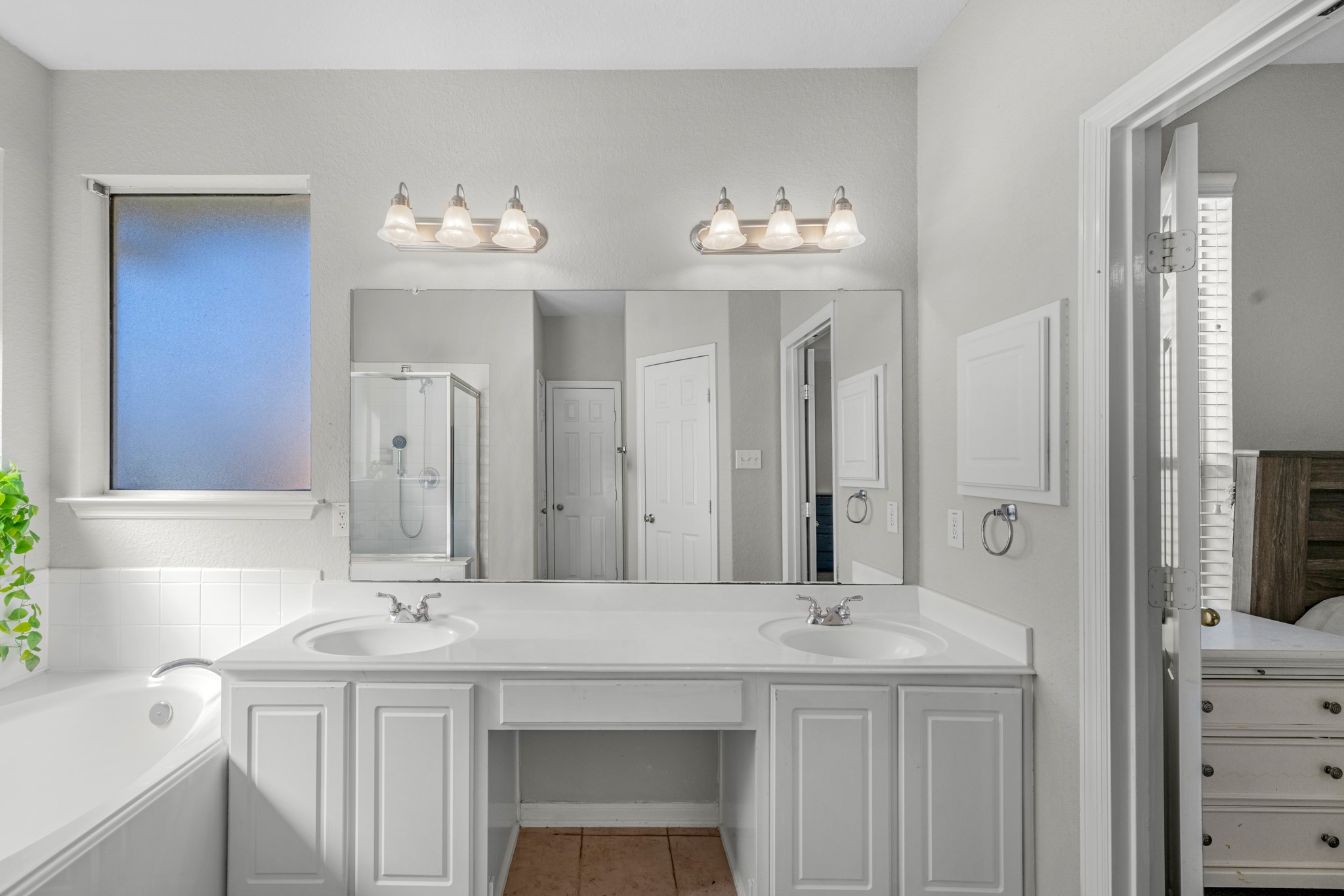 19310 Arbor Breeze Court Spring, TX 77379 - Photo 20 of 37 a bathroom with a sink double vanity and a mirror