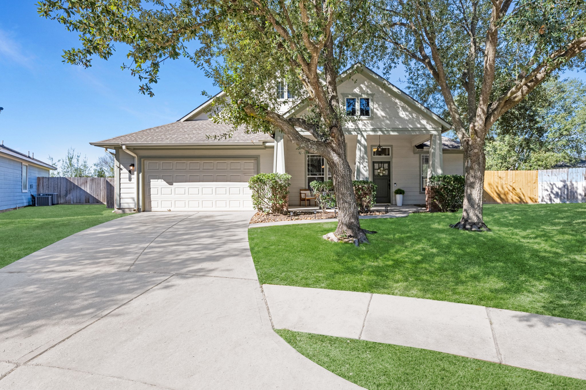 19310 Arbor Breeze Court Spring, TX 77379 - Photo 2 of 37 a front view of a house with garden