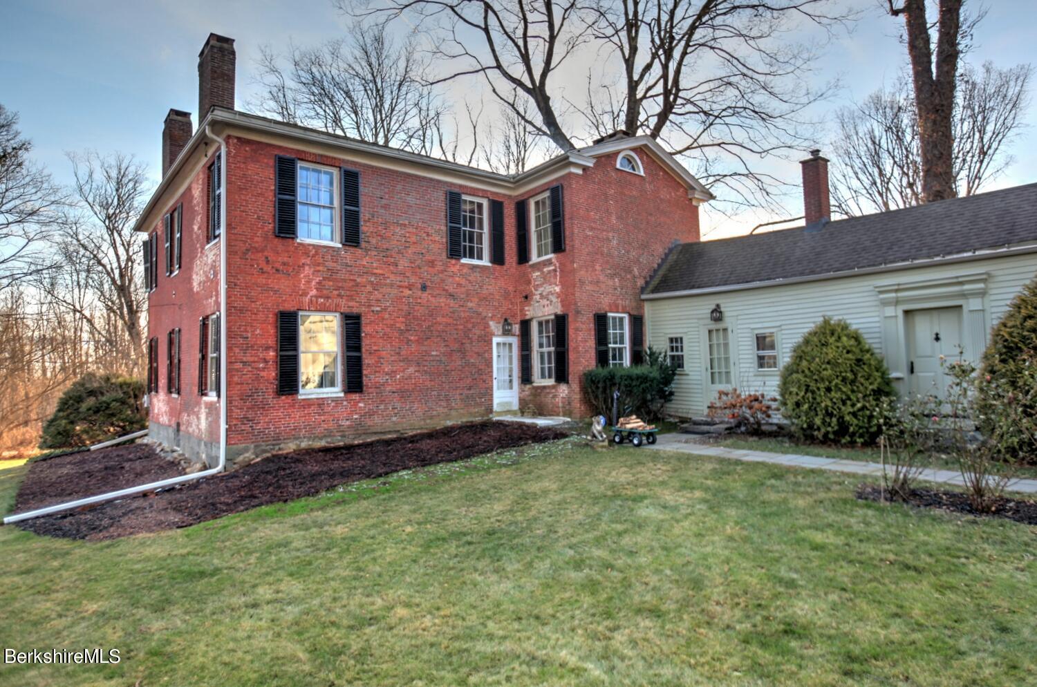 1586 Main Road Granville, MA 01034 - Photo 8 of 44 a view of a house with a yard and sitting area