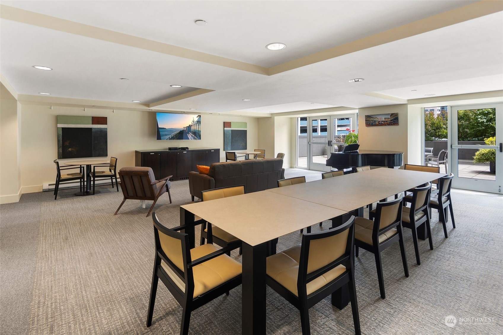 1415 2nd Avenue, Unit 2008 Seattle, WA 98101 - Photo 24 of 36 a view of a dining room with furniture