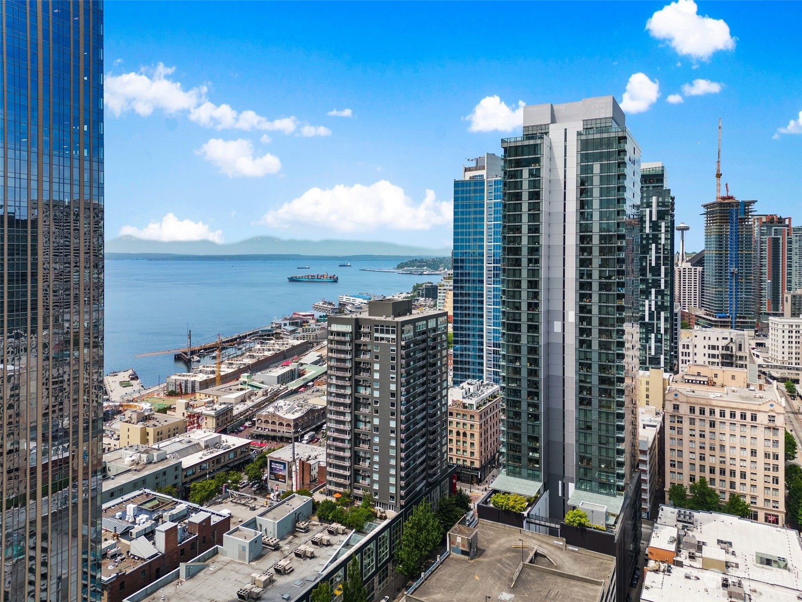 1415 2nd Avenue, Unit 2008 Seattle, WA 98101 - Photo 34 of 36 a view of a city with tall buildings