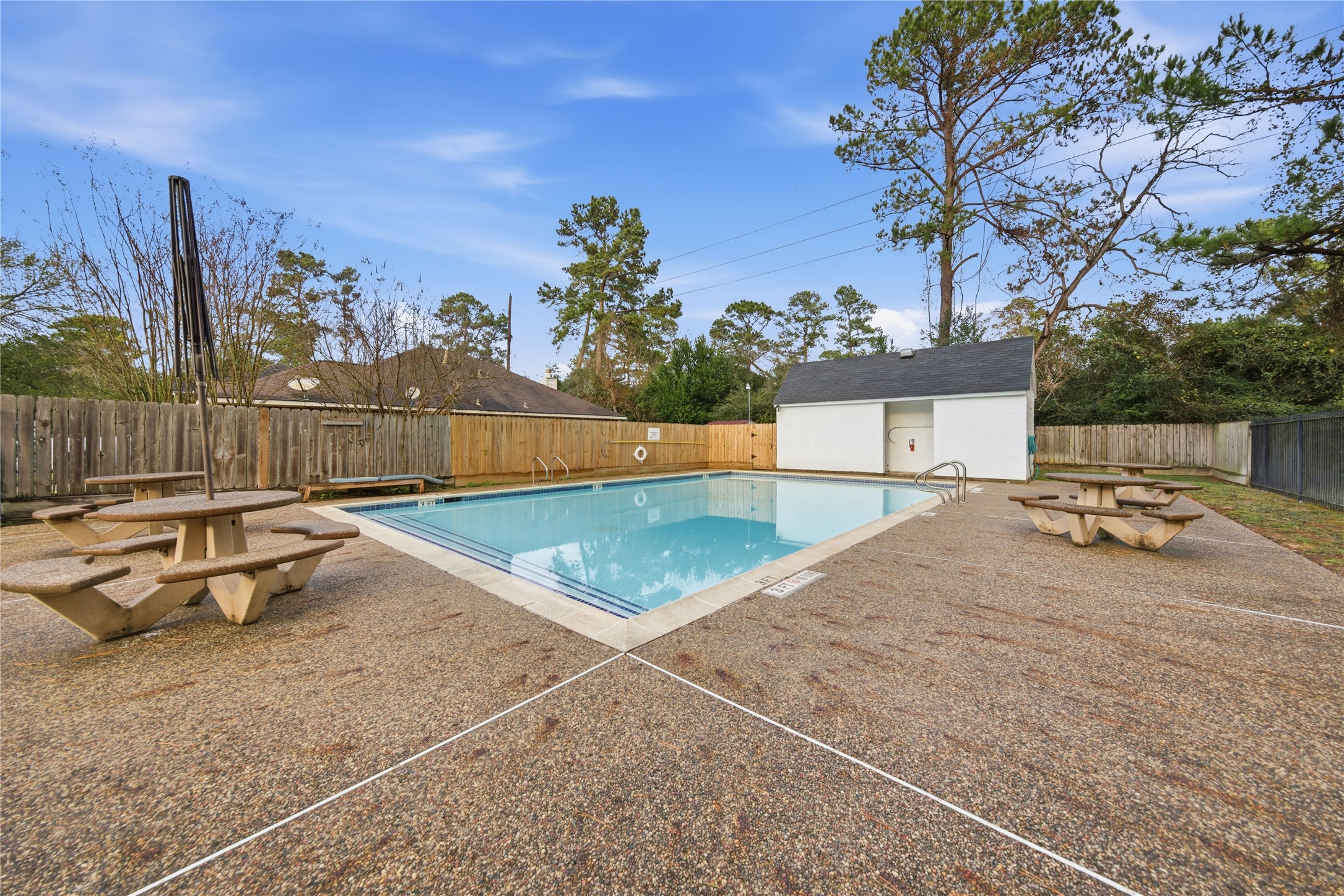 13506 Spring Court Tomball, TX 77375 - Photo 36 of 37 a view of a swimming pool with a lounge chair