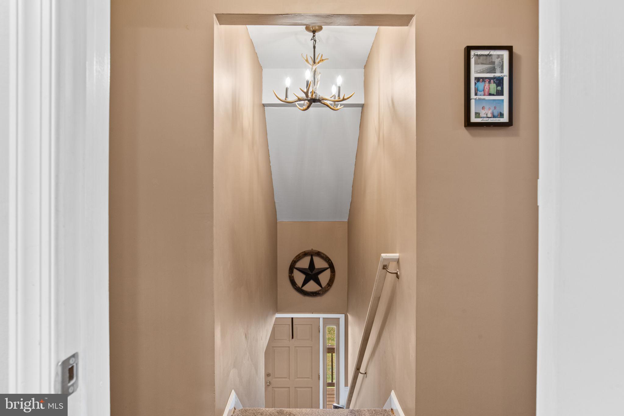 19773 Haugh Road Stewartstown, PA 17363 - Photo 27 of 58 a view of cabinet with wooden floor and a carpet