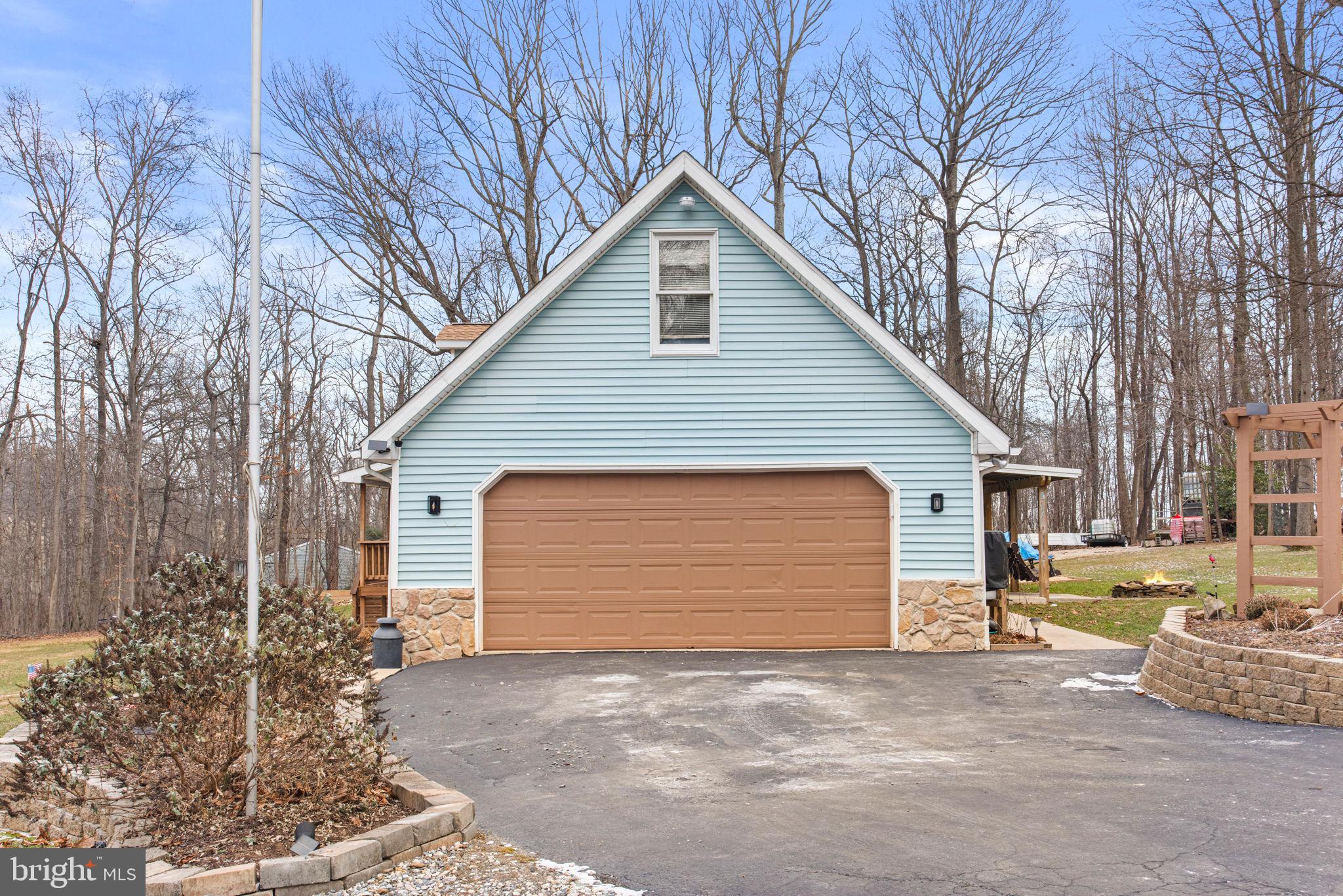 19773 Haugh Road Stewartstown, PA 17363 - Photo 4 of 58 side of the house and side garage