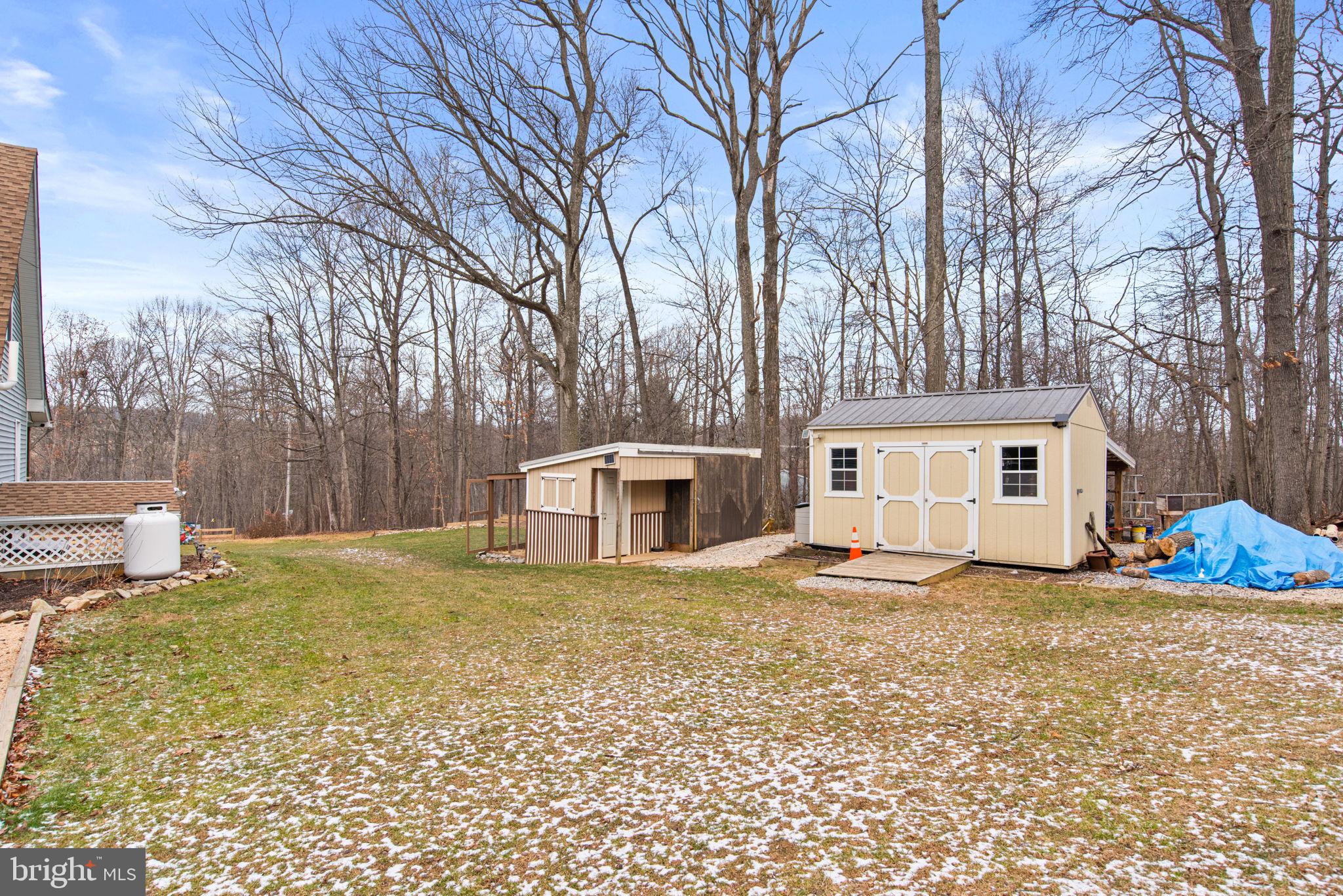 19773 Haugh Road Stewartstown, PA 17363 - Photo 57 of 58 a house that has a tree in front of it