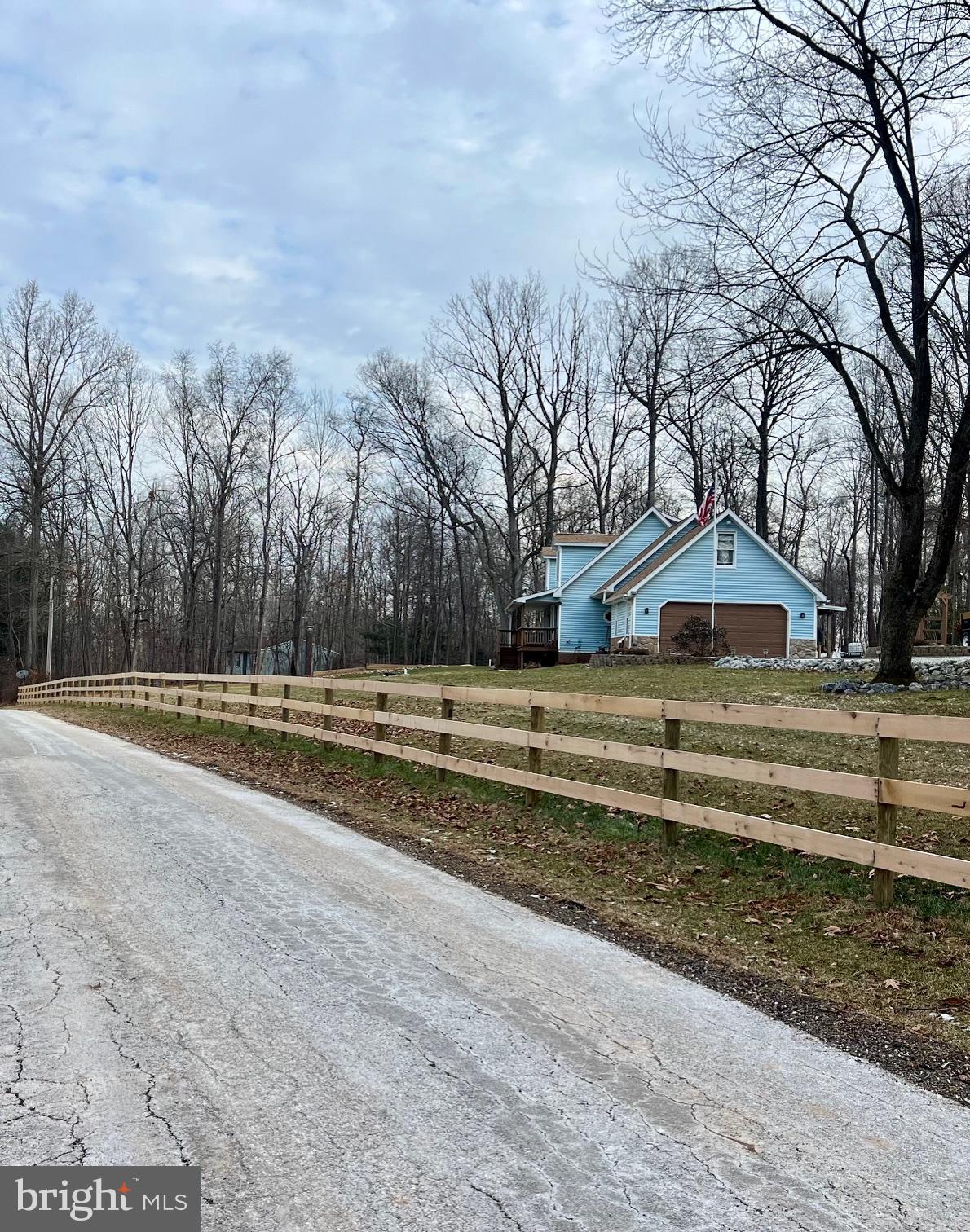19773 Haugh Road Stewartstown, PA 17363 - Photo 7 of 58 a view of dirt yard with large trees