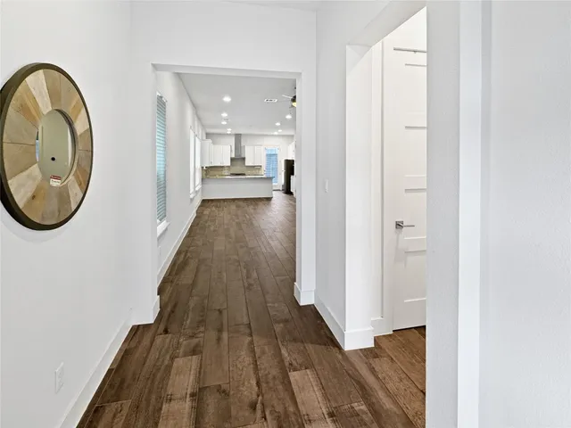 a view of a livingroom from a hallway