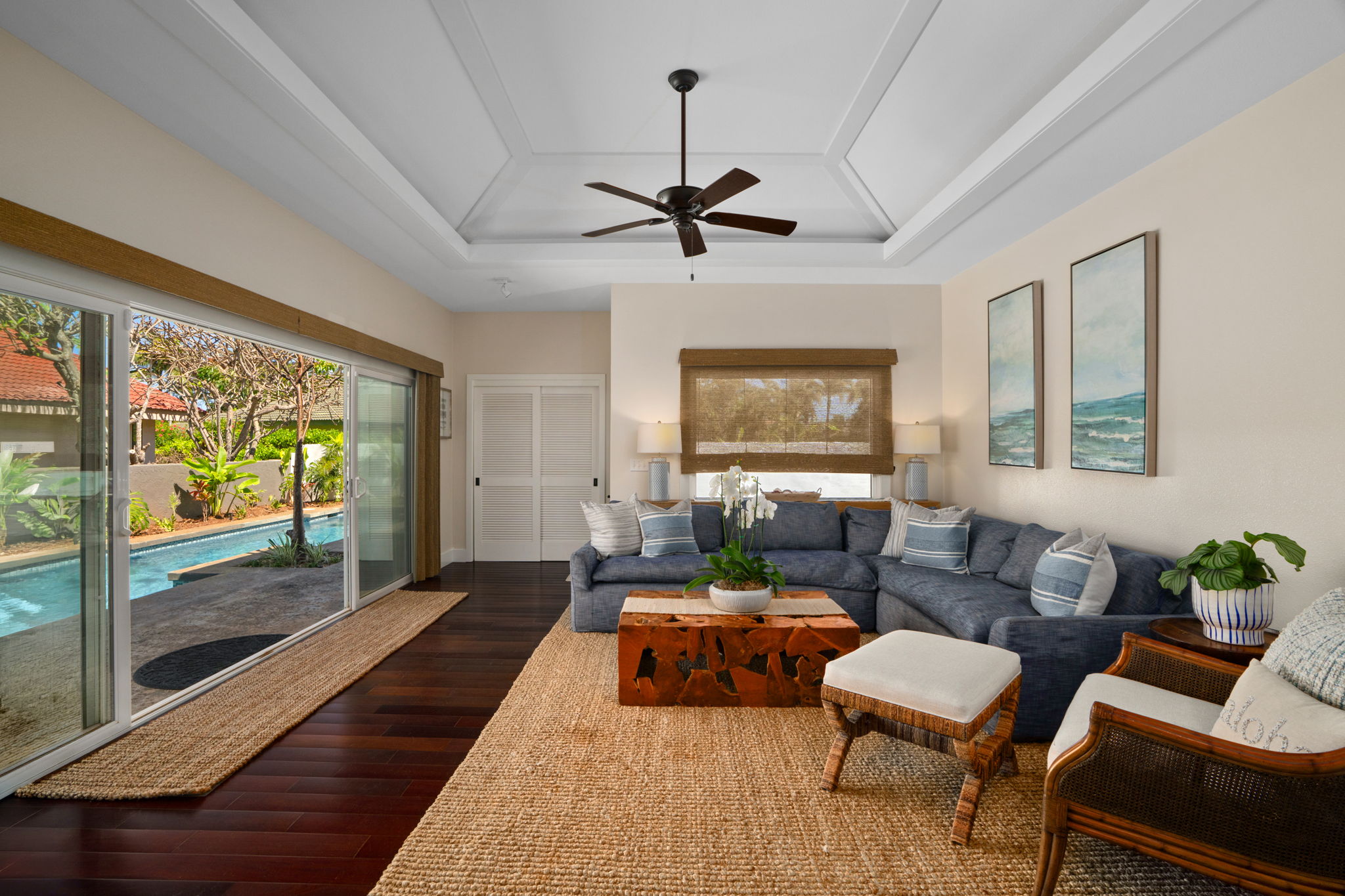 1753 Kelaukia Street Koloa, HI 96756 - Photo 3 of 27 a living room with furniture and a flat screen tv
