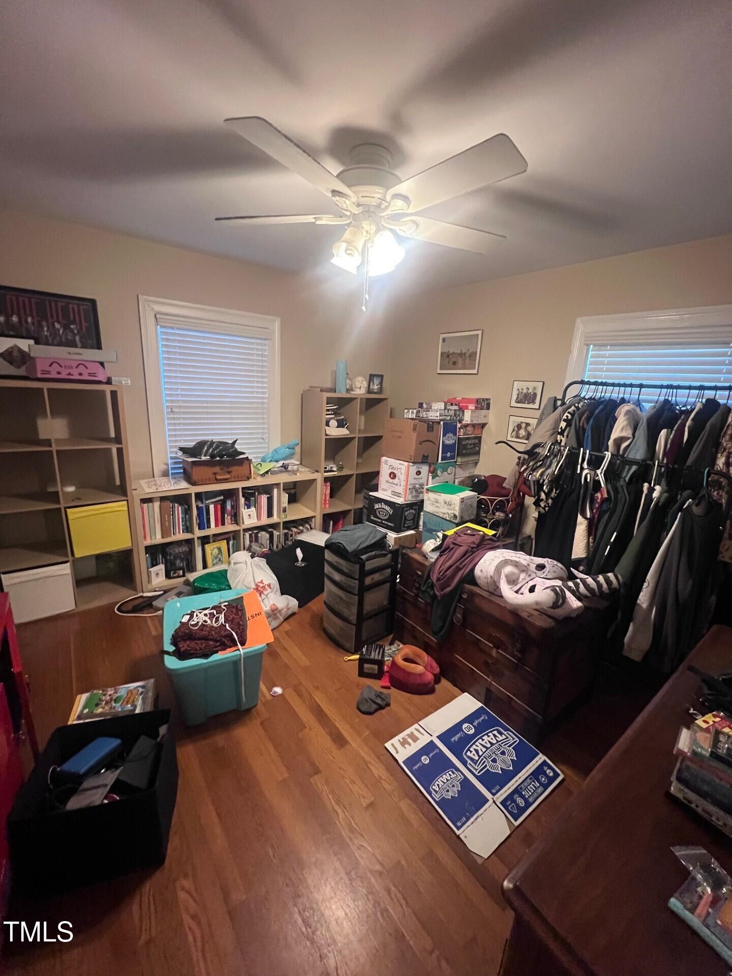 2260 The Circle Raleigh, NC 27608 - Photo 8 of 9 a living room with furniture and a flat screen tv