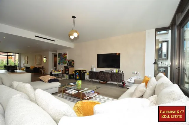 a hallway with wooden floor in a house