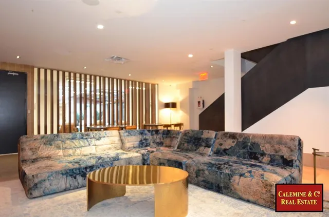 a dinning table & chairs in a room