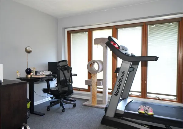 a view of a room with gym equipment