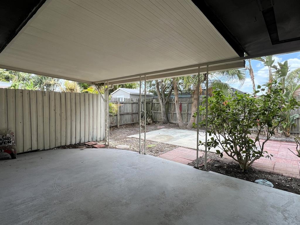 2489 Del Rio Way Dunedin, FL 34698 - Photo 22 of 24 a view of a room with a patio
