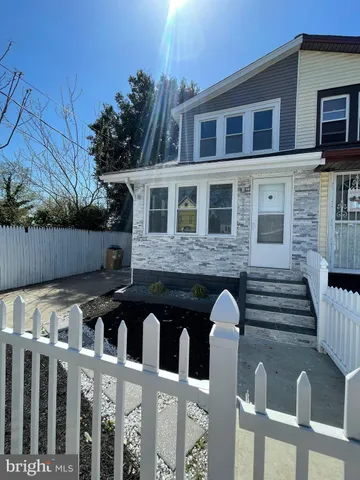 a front view of house with yard
