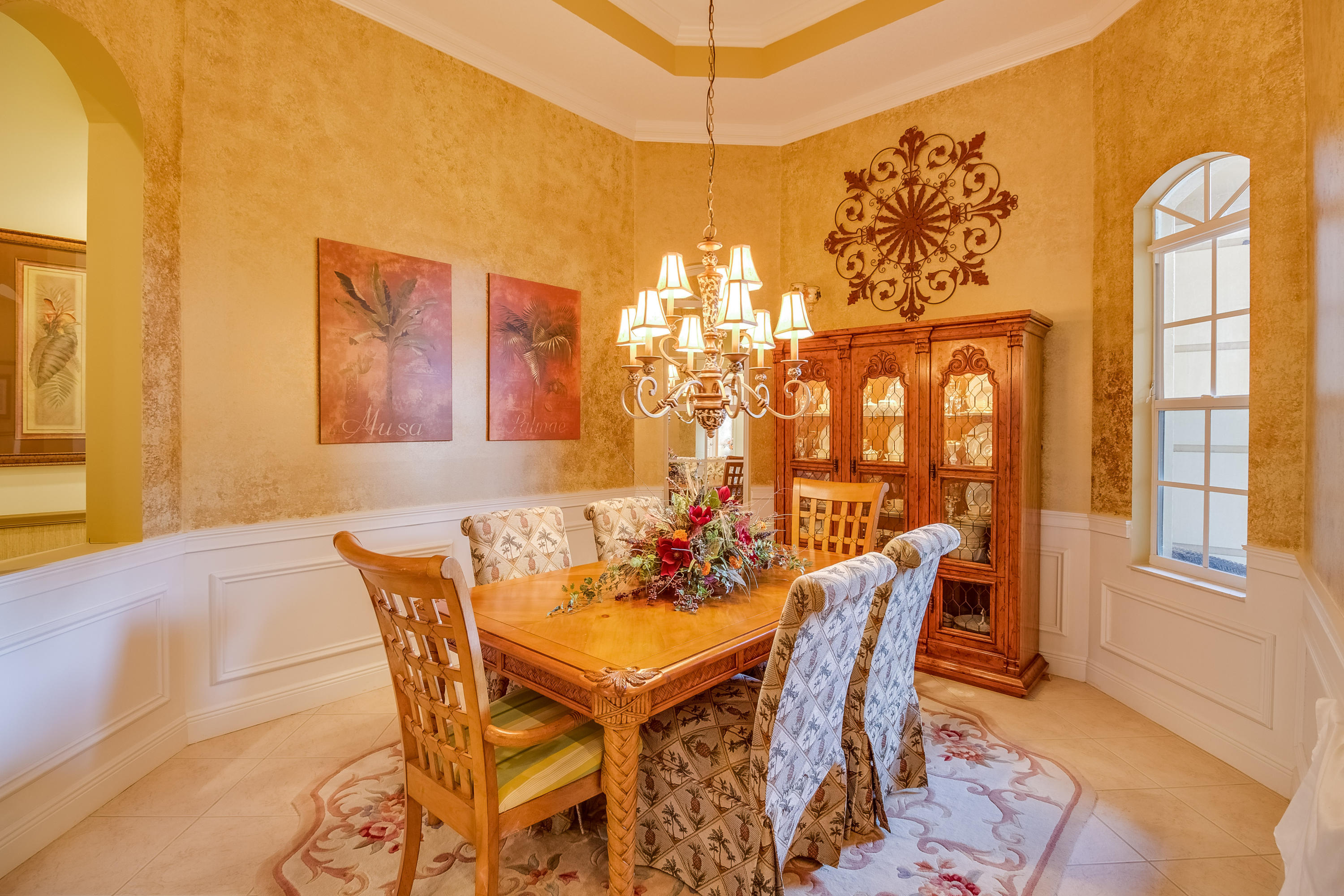 8617 Tompson Point Road Port St. Lucie, FL 34986 - Photo 11 of 38 a view of a dining room with furniture and window
