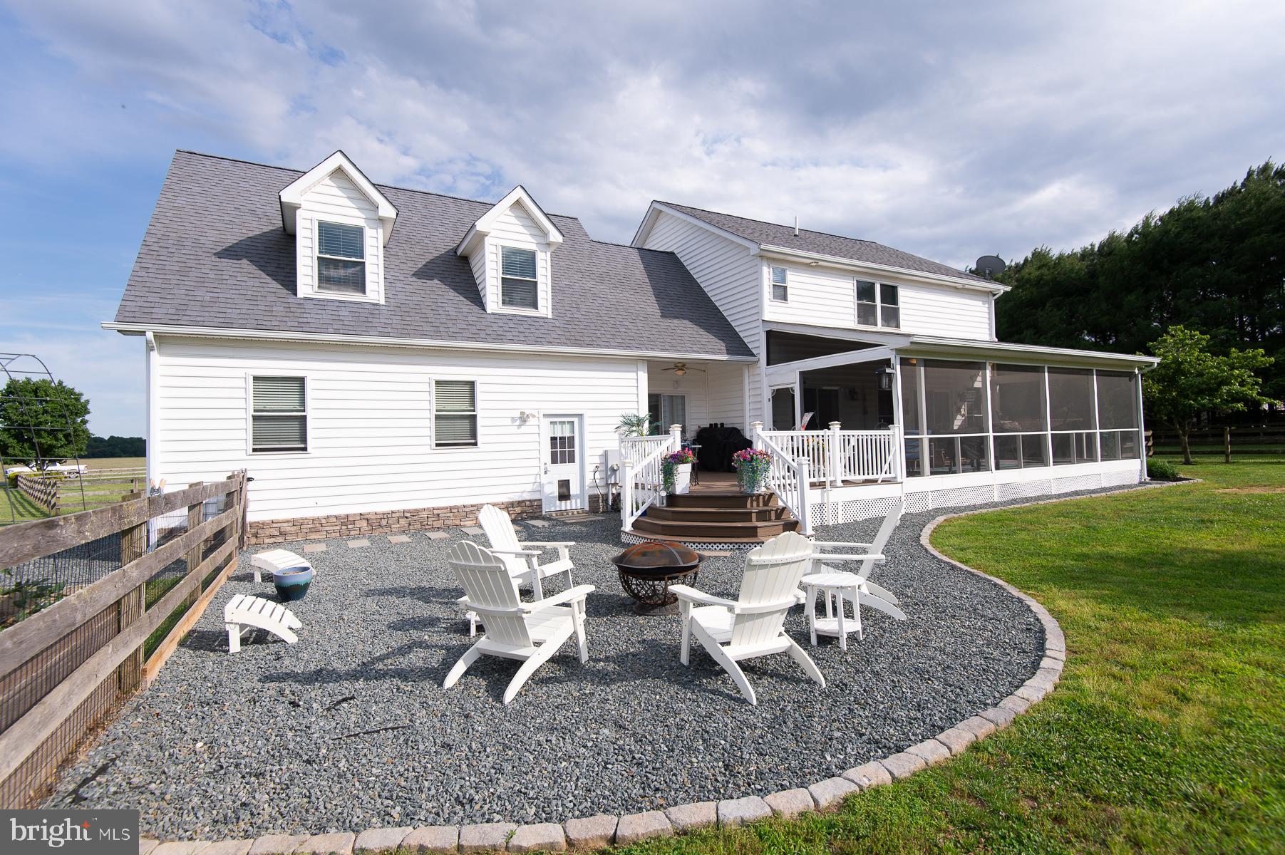 12136 Holly Road Ridgely, MD 21660 - Photo 64 of 136 a view of a house with backyard sitting area and garden