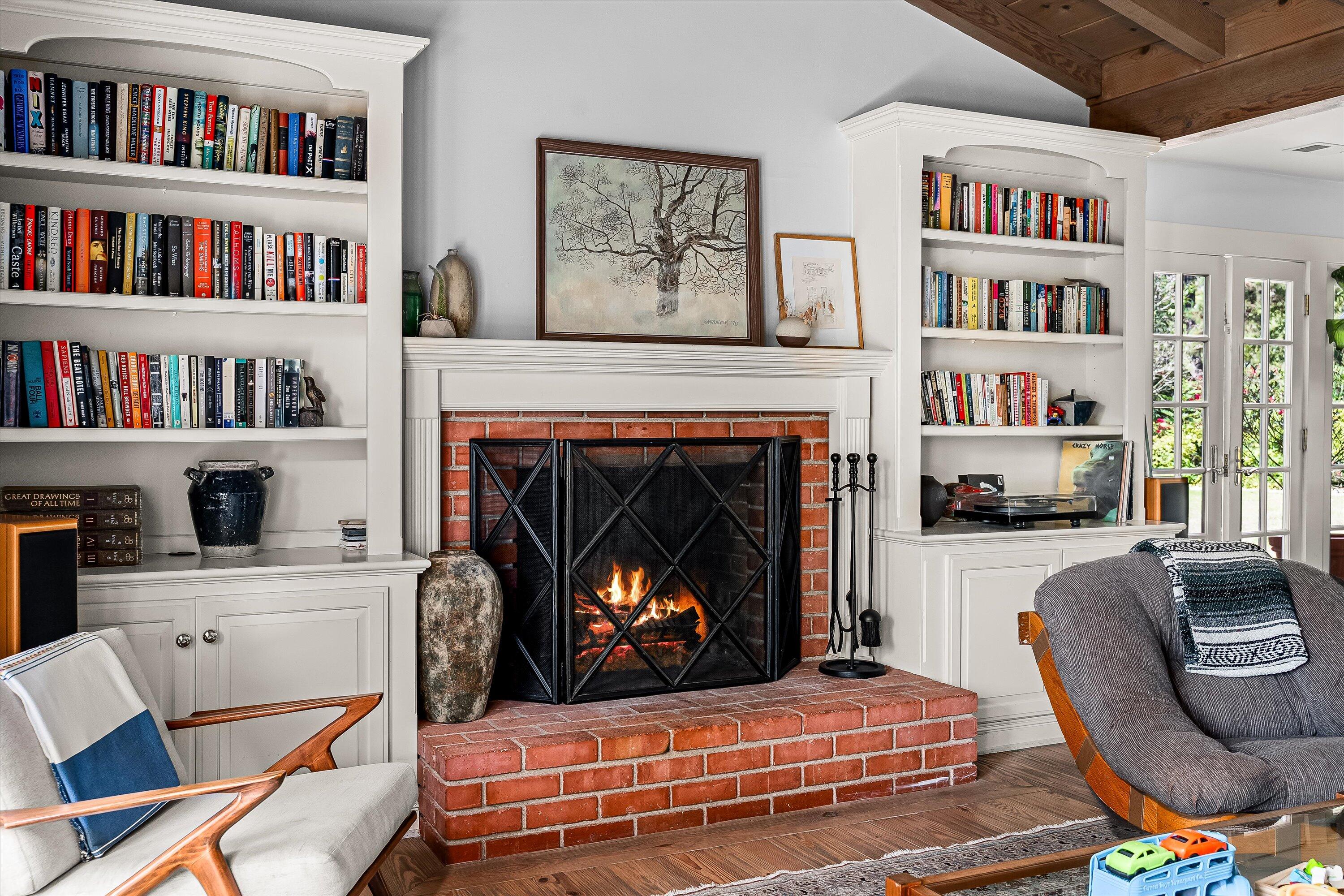1192 Edward Place Goleta, CA 93111 - Photo 13 of 29 a living room with furniture and a fireplace