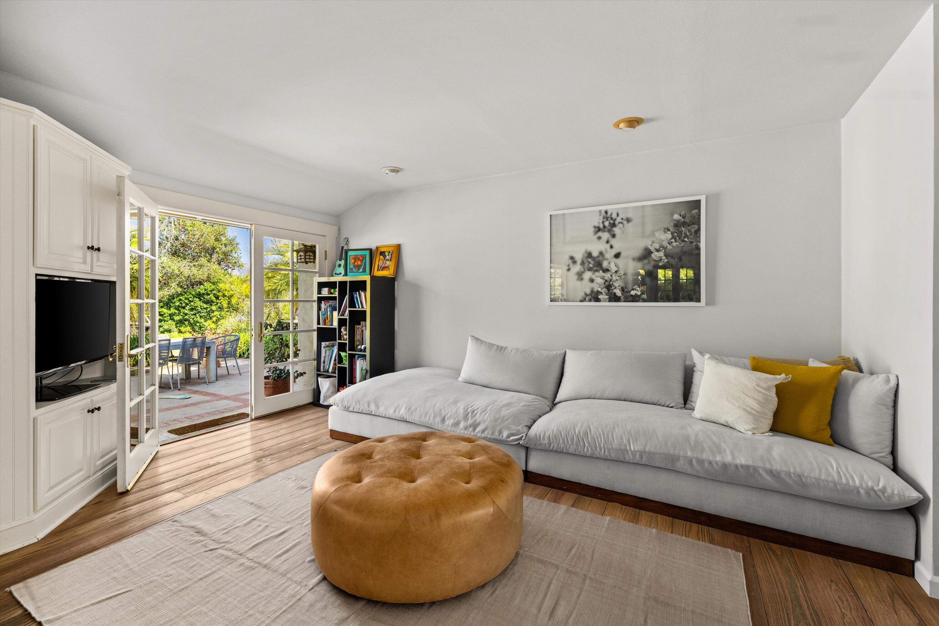 1192 Edward Place Goleta, CA 93111 - Photo 14 of 29 a living room with furniture and a flat screen tv