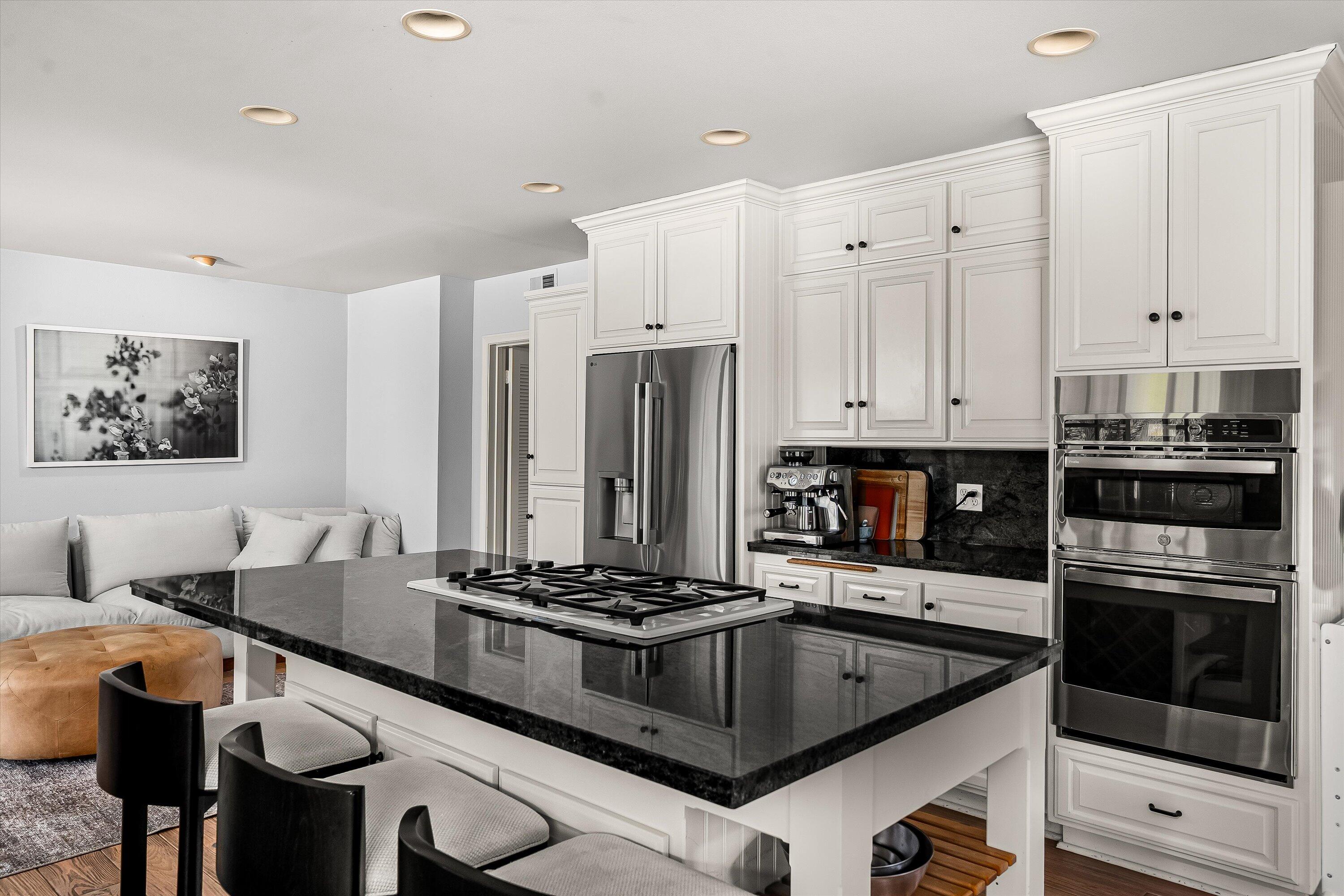 1192 Edward Place Goleta, CA 93111 - Photo 19 of 29 a kitchen with stainless steel appliances granite countertop a stove a sink and a refrigerator