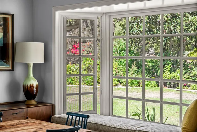 a spacious bedroom with a large bed and a fireplace