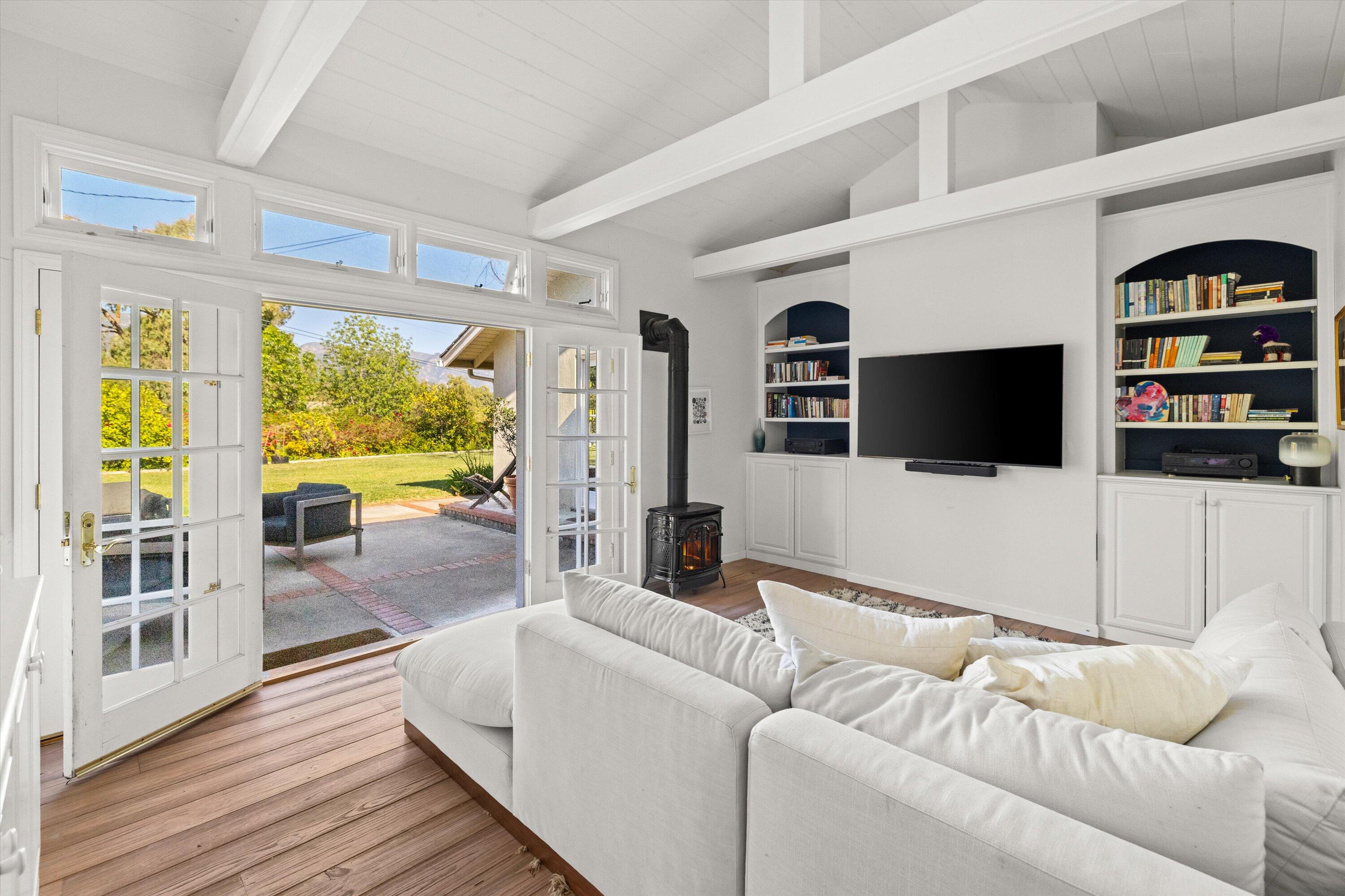 1192 Edward Place Goleta, CA 93111 - Photo 28 of 29 a living room with furniture and a flat screen tv