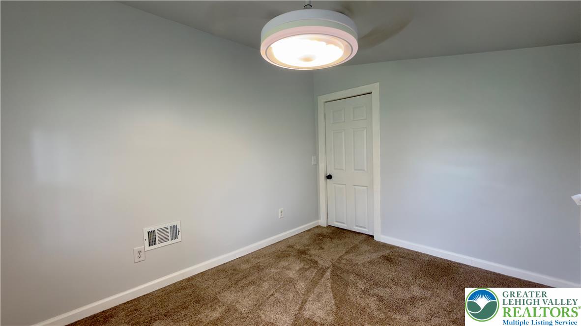 246 Poplar Street Bath, PA 18014 - Photo 14 of 34 A well-maintained interior space with soft carpeting provides a comfortable foundation.