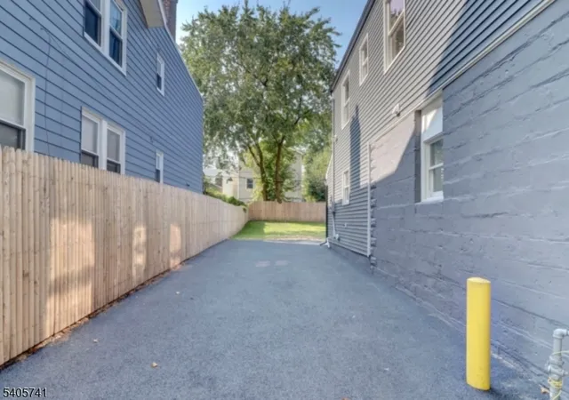 a view of a back yard of the house
