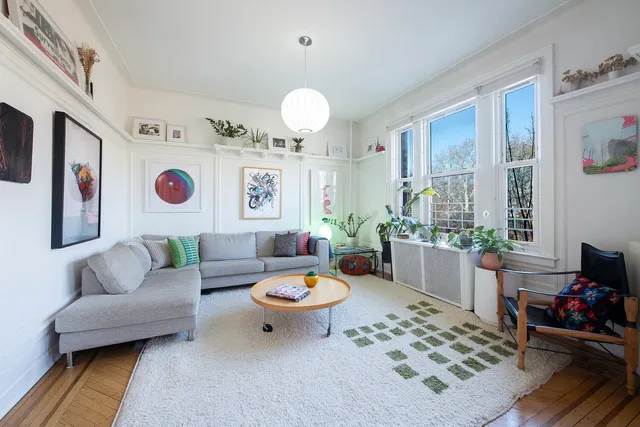 a picture of a bench in front of a microwave