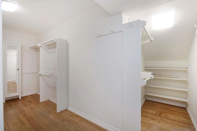 a view of an empty walk in closet